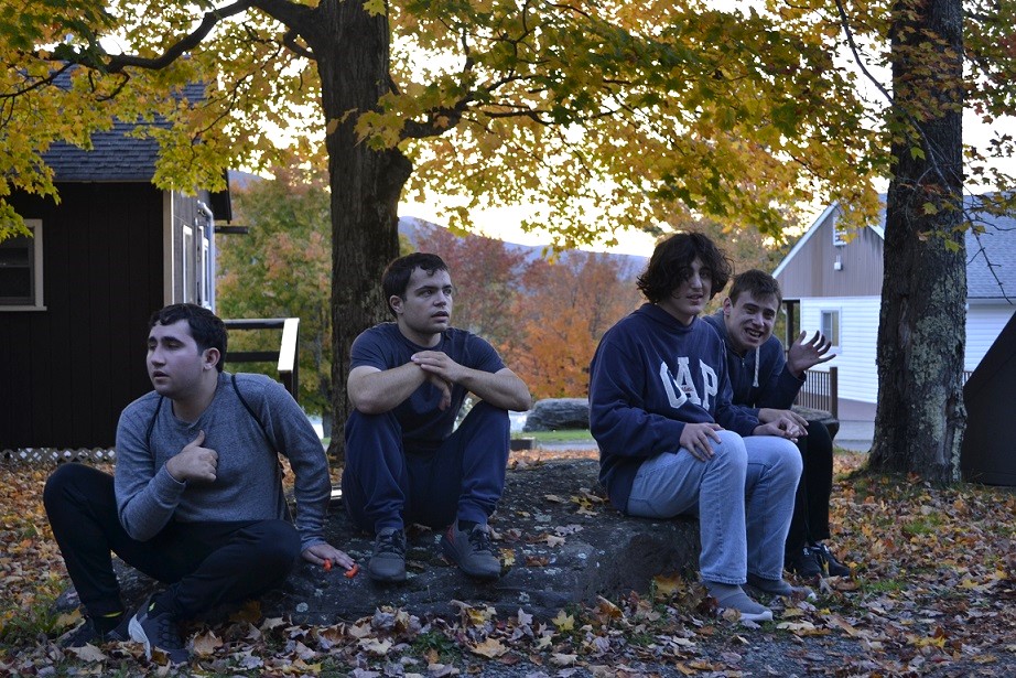 Four young men supported by Children’s Residential Program at Camp Loyaltown
