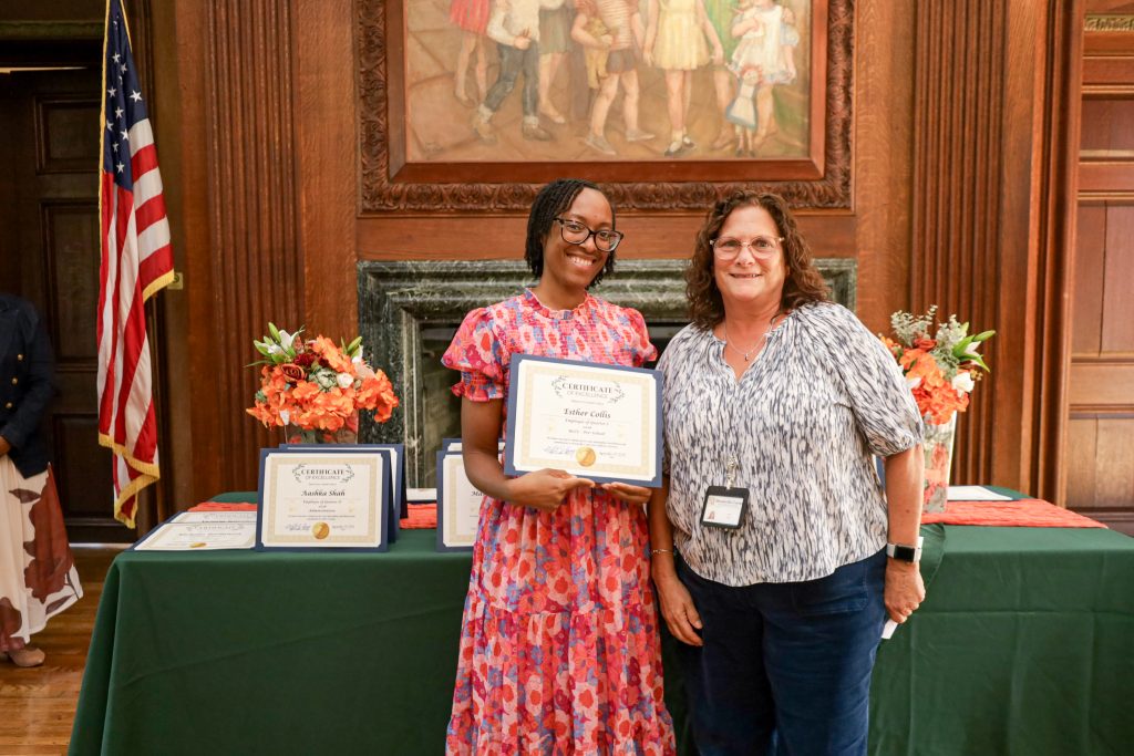 Esther Collins receives her Employee of the Quarter award