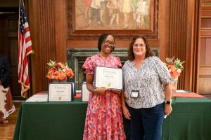 Esther Collis received her Employee of the Quarter award