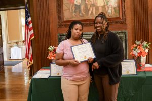 Eminellee Cooper receives her Employee of the Quarter award