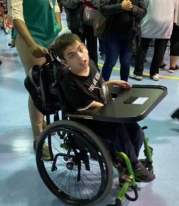 Student in a wheelchair enjoys Halloween party